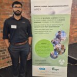 APEX 2024 Vatsla Gajjar Powerco's young engineer Vatsal Gajjar stands infront of APEX banner